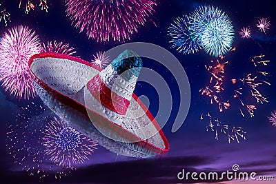 High contrast image of Mexican hat / sombrero in the sky with fireworks Stock Photo