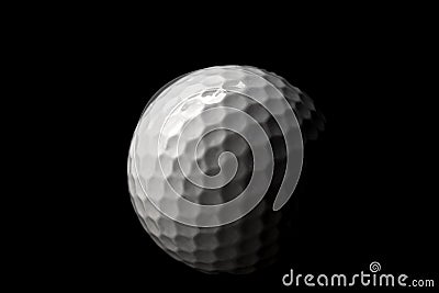 High contrast studio shot of golf ball isolated on black background with dramatic light Stock Photo