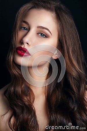 High fashion look. glamor closeup portrait of beautiful stylish brunette young woman model with bright makeup with red lips. Stock Photo