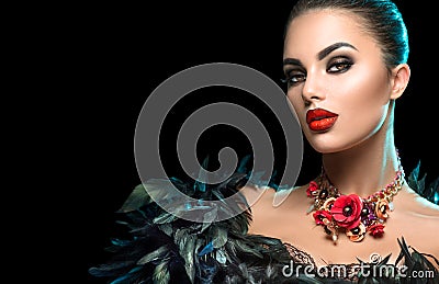 High Fashion Model Girl Portrait with Trendy gothic make-up, Black Hair style, Make up, dark accessories over black background Stock Photo