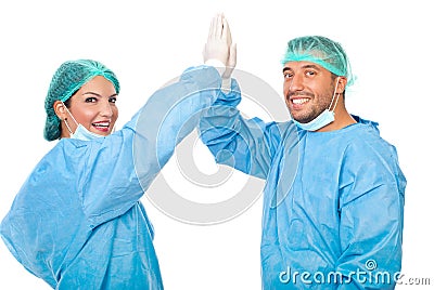 High five happy surgeons team Stock Photo