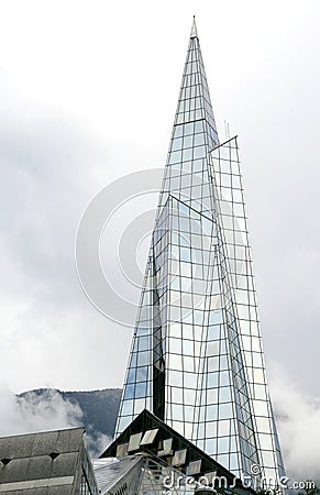 High glass spire building in Andorra Stock Photo