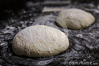 High hydration rye and wheat sourdough loaf shaped for an artisanal rustic wholegrain sourdough bread loaf, photo series Stock Photo