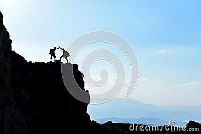 High mountain range and climbers Stock Photo