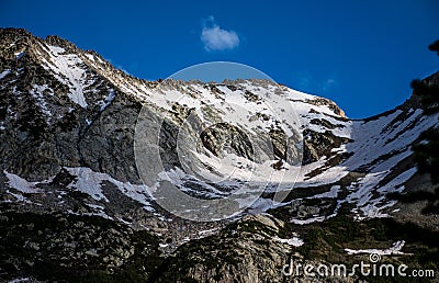 High Peak in the Colorado Rocky Mountains With Snow in June Stock Photo