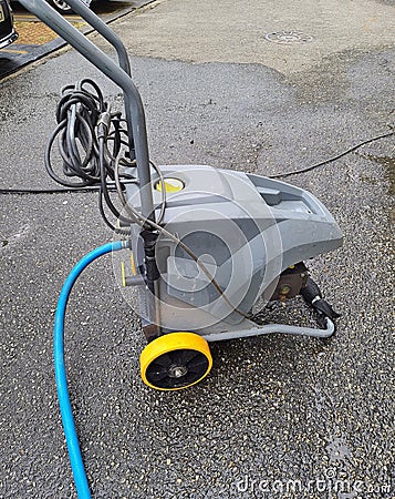 High pressure washer, insulates on concrete floors. Stock Photo