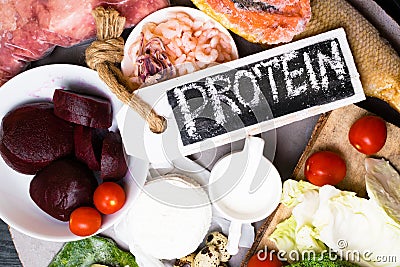 High protein food - fish, meat, sea slug, shrimps, eggs, cabbage, beet, broccoli, spinach, tomatoes, avokado, salmon. Products goo Stock Photo