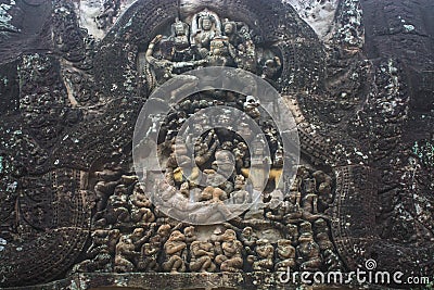 High relief sandstone carvings depicting monkeys in the story of the Ramayana at Angkor Wat Siem Reap Temple Stock Photo