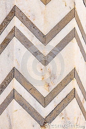 High res ancient natural white travertine marble with dark gray zig zag symmetrical patterns Stock Photo