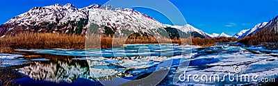 High Res Panorama of Mountain Range Reflected in t Stock Photo