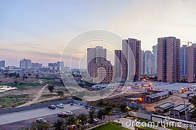 High rise buildings in gurgaon delhi NCR shot at dusk Stock Photo