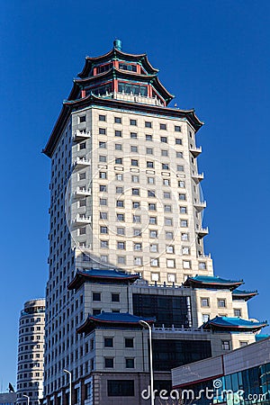 High-rise residential building in form of Chinese pagoda in center of modern city of Astana. Republic of Kazakhstan Editorial Stock Photo