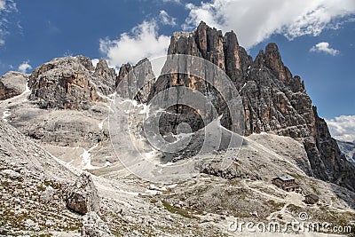 High rocky peaks of Pale di San Martino, in Italian Dolomites with dramatic deep blue sky on sunny day Stock Photo