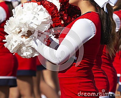 Close up cheerleaders pom pom while she cheers Editorial Stock Photo