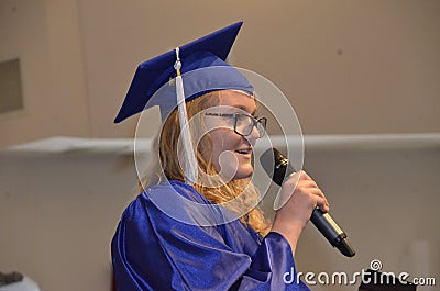 High school graduate gives a speech at her graduation Editorial Stock Photo
