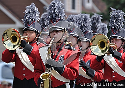 High School Marching Band Performing in Parade Editorial Stock Photo