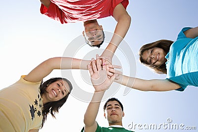High School Students Huddling Hands Stock Photo