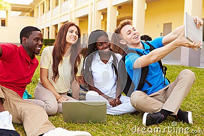 High School Students Taking Selfie With Digital Tablet Stock Photo