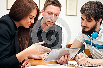 High school students using tablet computer Stock Photo