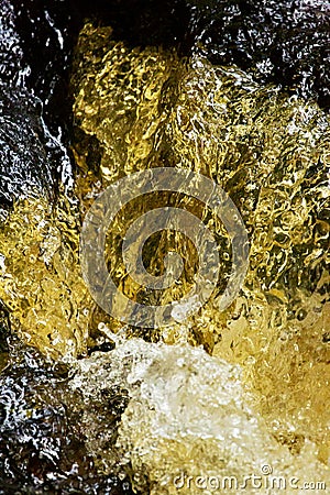 Stop action view of a Connecticut waterfall, amber from tannins Stock Photo