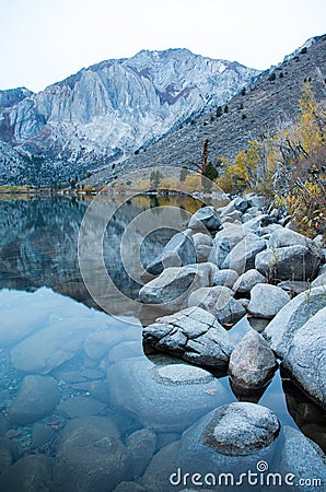 Granite fall on a lake of Rocks Stock Photo