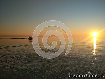 High speed boat and sunset Stock Photo