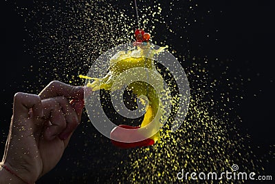 High speed shot of a colors filled balloon burst Stock Photo