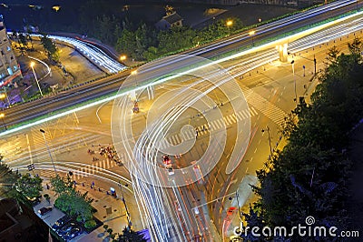 High-speed traffic and blurred light trails Stock Photo