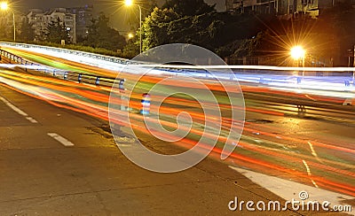 High speed traffic and blurred light trails Stock Photo