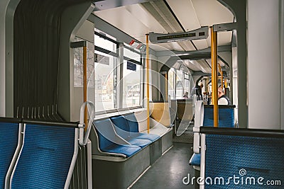 High-speed tram on the city street. Modern Tram In Dusseldorf, Germany October 20, 2018. Tram inside view, passenger compartment Editorial Stock Photo