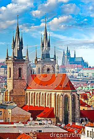 High spires towers of Tyn church in Prague city Stock Photo