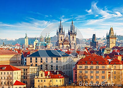 High spires towers of Tyn church in Prague city Stock Photo