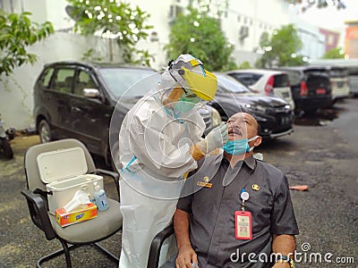 With the high spread of the corona virus, the South Kalimantan government has held a swab test for all employees Editorial Stock Photo