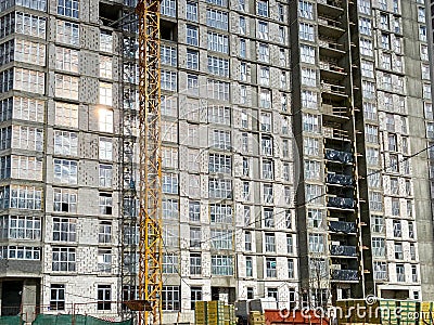 High Storey Building Under Construction With Tower Crane And Workers Men Stock Photo
