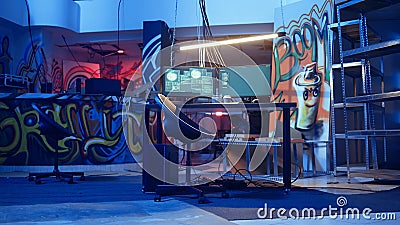 High tech computer system running malicious code in empty basement Stock Photo