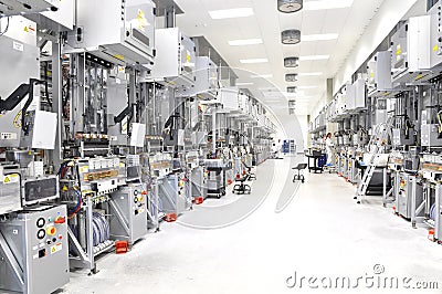 High tech factory - production of solar cells - machinery and in Stock Photo