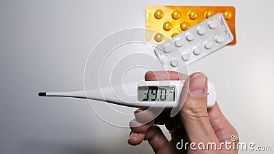 High temperature thermometer measurement, antipyretic tablets Stock Photo