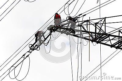 High-tension mast with assemblers Stock Photo