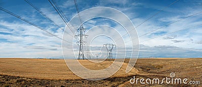 High tension power lines and towers Stock Photo