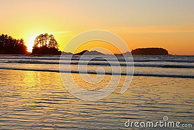Beautiful Tofino Sunset at Chesterman Beach, British Columbia, Canada Stock Photo