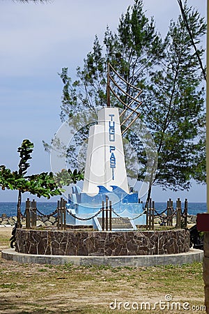 High tide monument or Pasti monument (pasang laut tertinggi). It is the boundary of marine area management Editorial Stock Photo