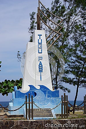 High tide monument or Pasti monument (pasang laut tertinggi). It is the boundary of marine area management Editorial Stock Photo