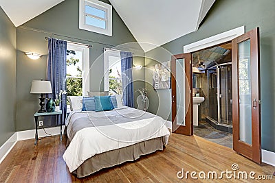 High vaulted ceiling bedroom interior design Stock Photo