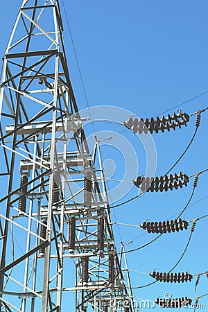 High voltage ceramic electrical insulators at a power station Stock Photo