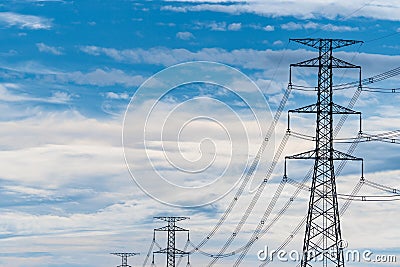 High voltage electric pole and transmission line. Electricity pylons. Power and energy. Energy conservation. High voltage grid Stock Photo