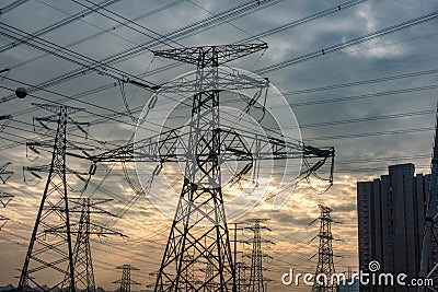 High voltage electricity towers to power a massive city Stock Photo