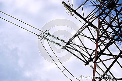 High voltage power line with insulation divider of electric power wires for safe delivering of electrical energy through Stock Photo