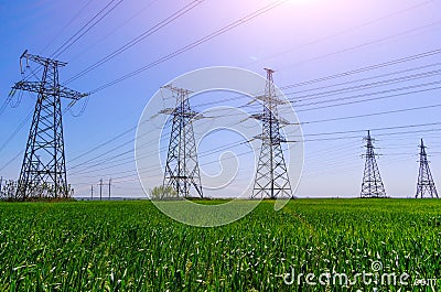 High-voltage power lines at sunset. electricity distribution station . Stock Photo