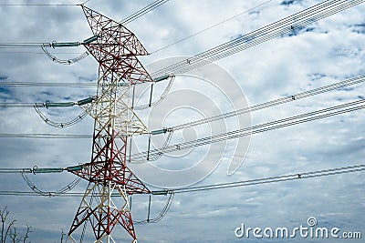 High voltage tower with cloudy sky background Stock Photo