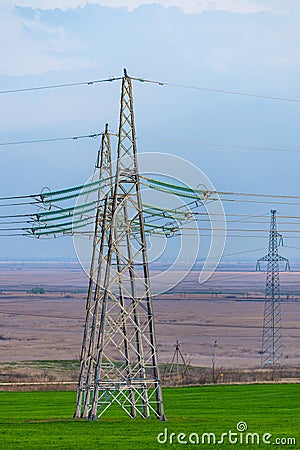 High voltage towers with sky background Stock Photo